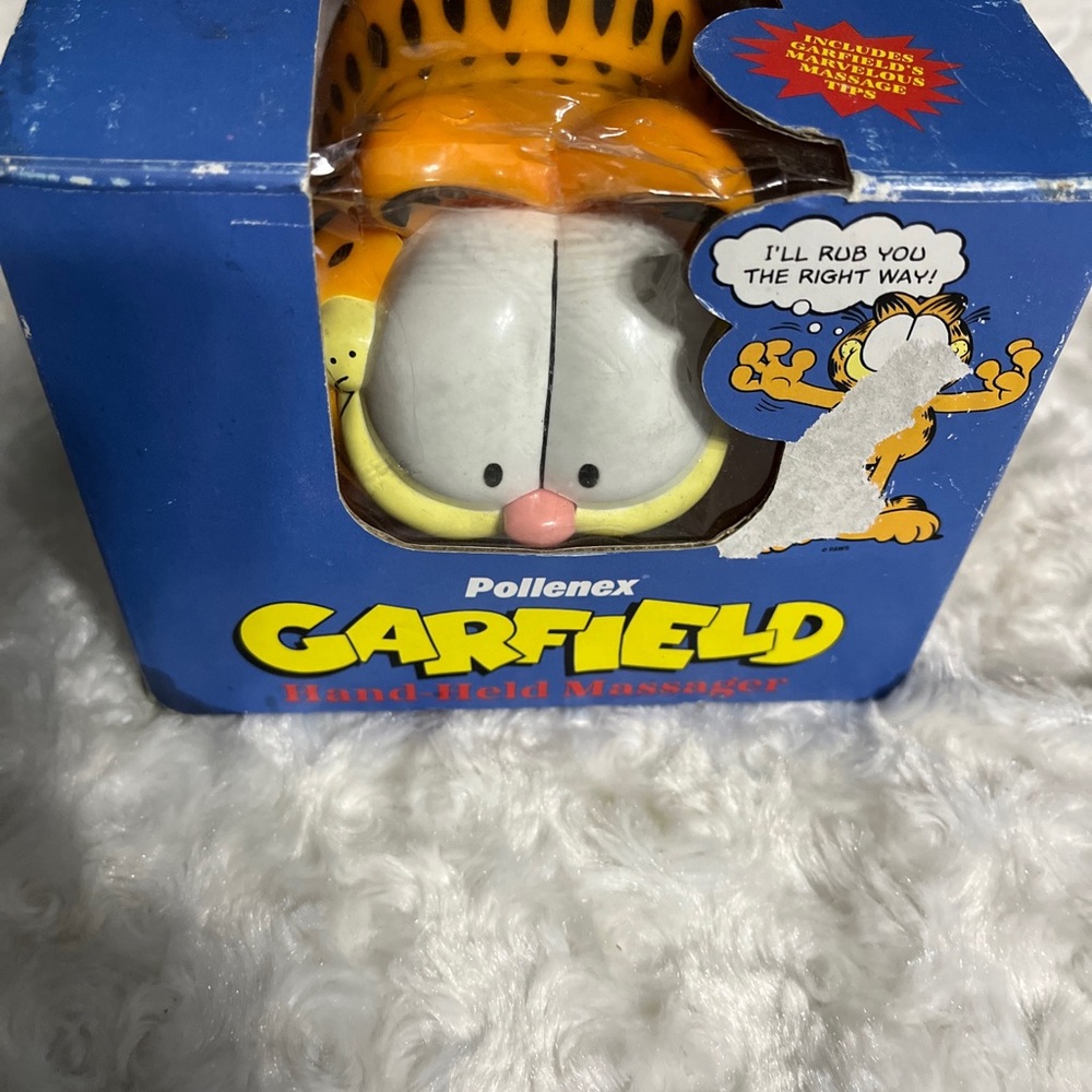 Pollenex Garfield Hand Held Massager battery operated, plastic